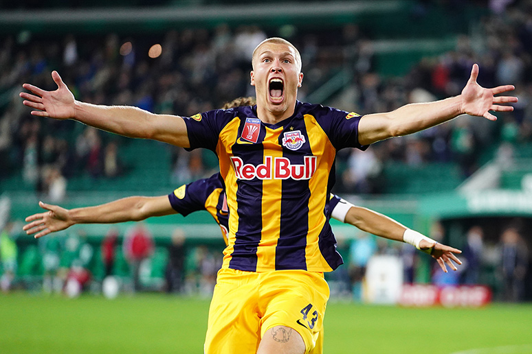 VIENNA, AUSTRIA - SEPTEMBER 25: Rasmus Kristensen of Salzburg and Andre Ramalho of Salzburg are celebrating their game winning goal in extra time during the OeFB cup match between SK Rapid Wien and FC Red Bull Salzburg at Allianz Stadion on September 25, 2019 in Vienna, Austria.